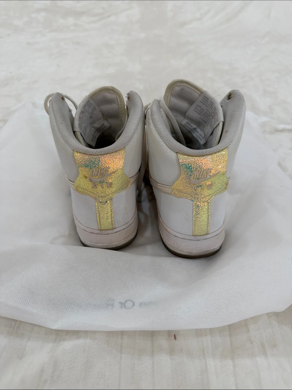 Nike Women’s High-Top Sneakers in White with Gold Heel Accent